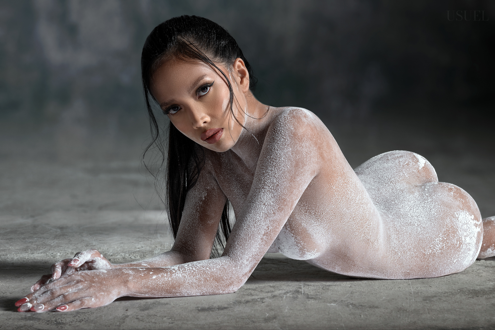 Female Model Iya covered in flour on her body, photographed by Carl Jacobs