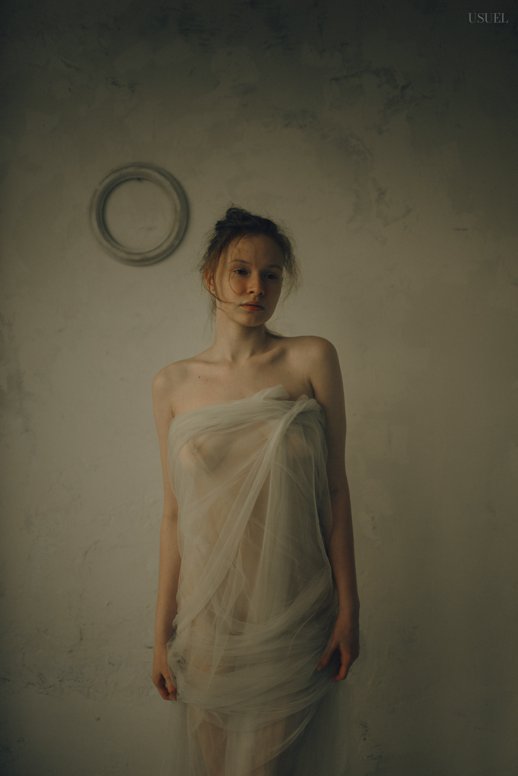 Portrait of Kapitolina Rakovskaya, a captivating and mysterious model, photographed by Vera Markevich.